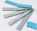 Self adhesive iron weights for pianos